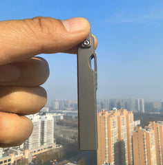 4-in-1 Compact Titanium Survival Tool Keychain with Saw Whistle and Pry Bar 07FC0E-D4 - KOEEK