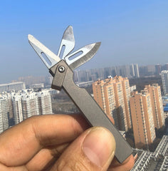 4-in-1 Compact Titanium Survival Tool Keychain with Saw Whistle and Pry Bar 07FC0E-D4 - KOEEK