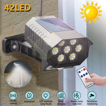 new 42 LED Solar Power PIR Motion Sensor Fake Camera Wall Light Outdoor Garden Lamp