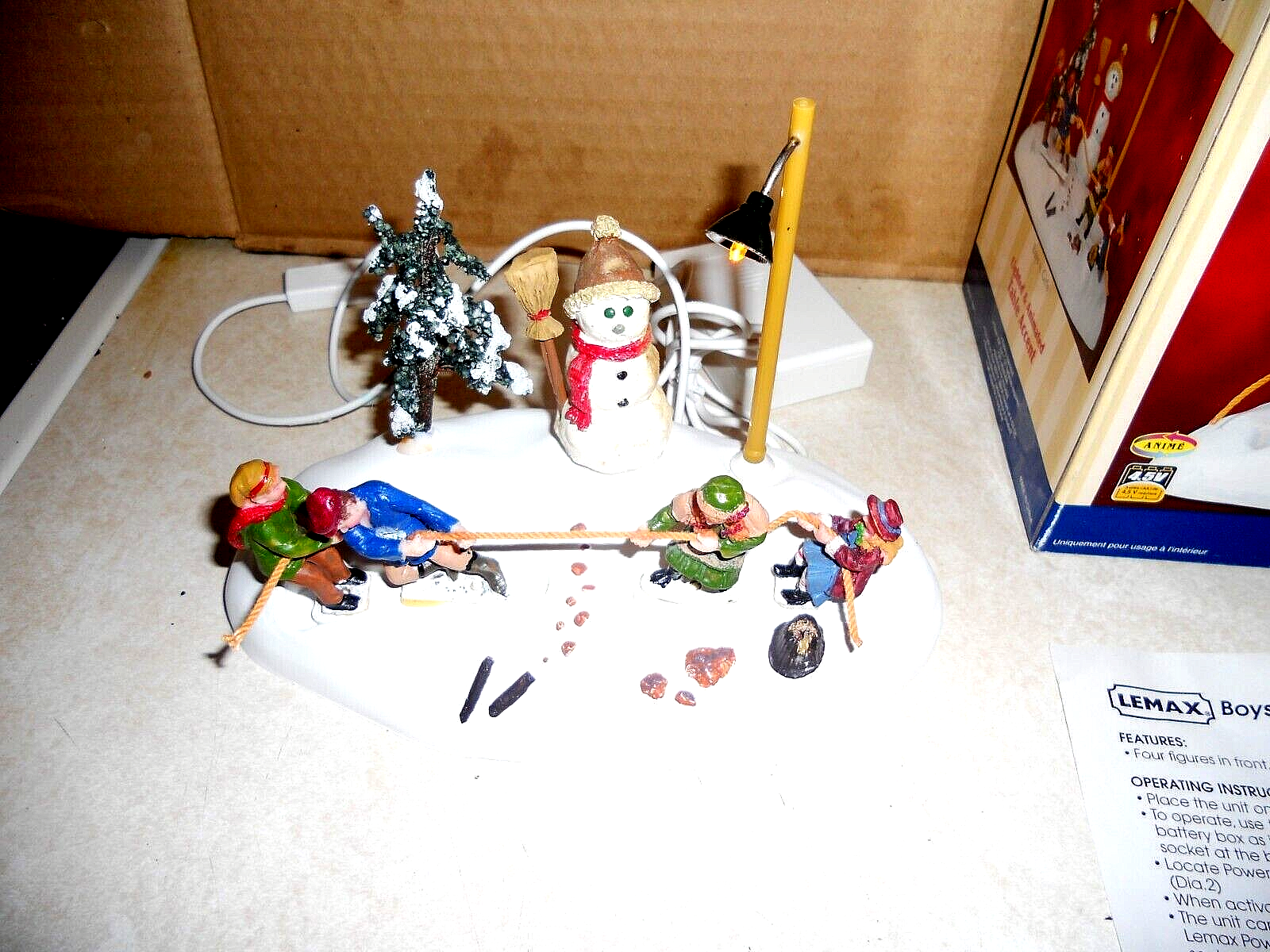 IOB LEMAX 2007 BOYS V GIRLS TABLE ACCENT LIGHTED ANIMATED CHRISTMAS TUG OF WAR LEMAX - KOEEK